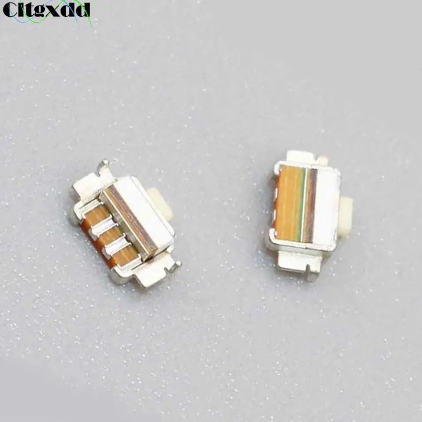 Dos aretes con diseño a rayas