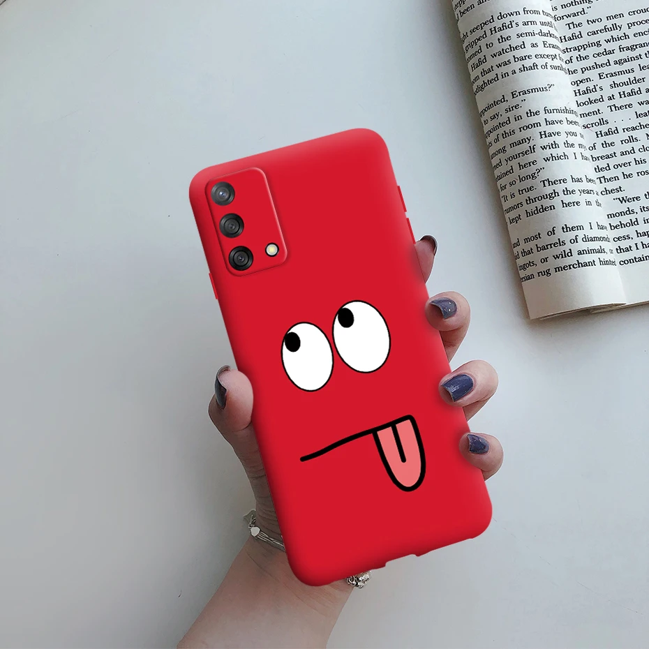Un teléfono rojo con una cara