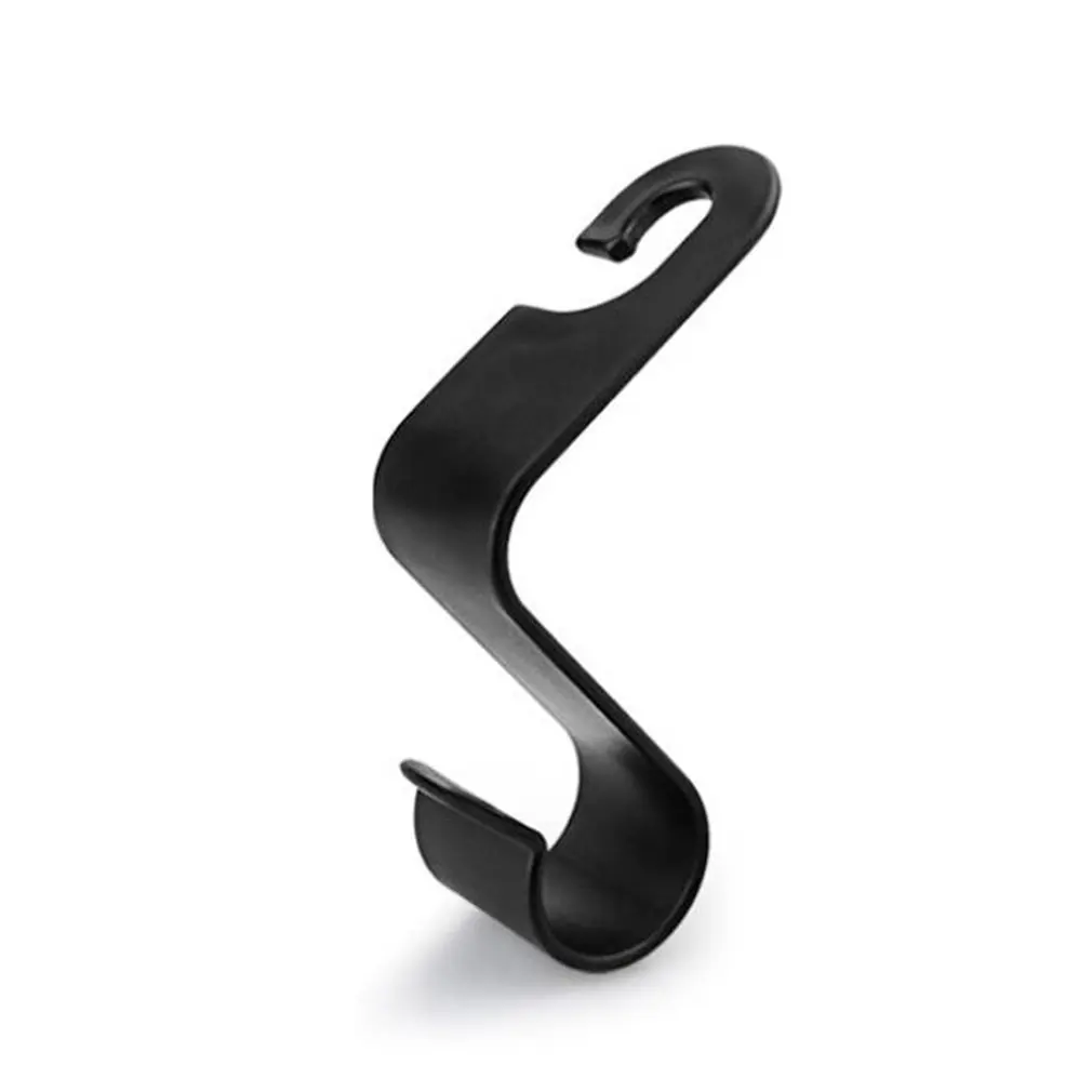 Un gancho negro sobre un fondo blanco