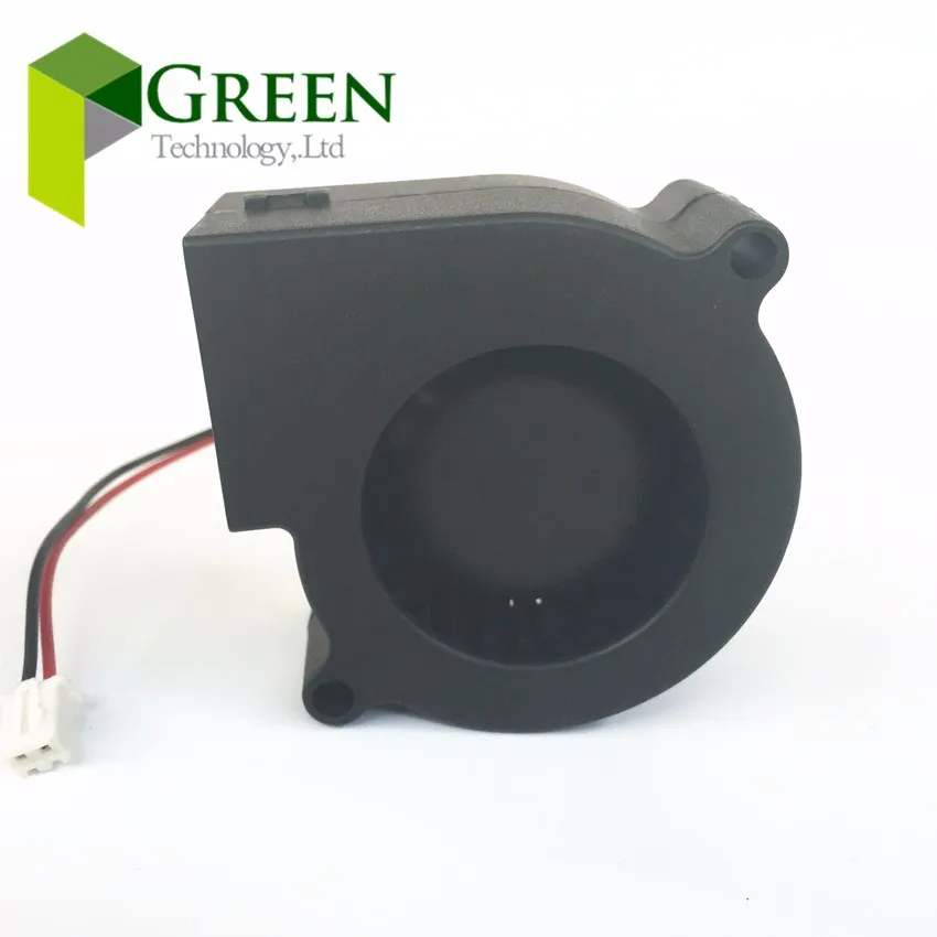 Un objeto negro con un cordón blanco unido a él