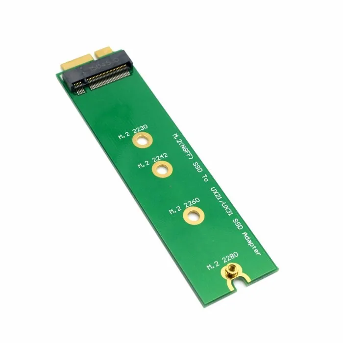 Un componente electrónico verde y blanco con un conector de oro