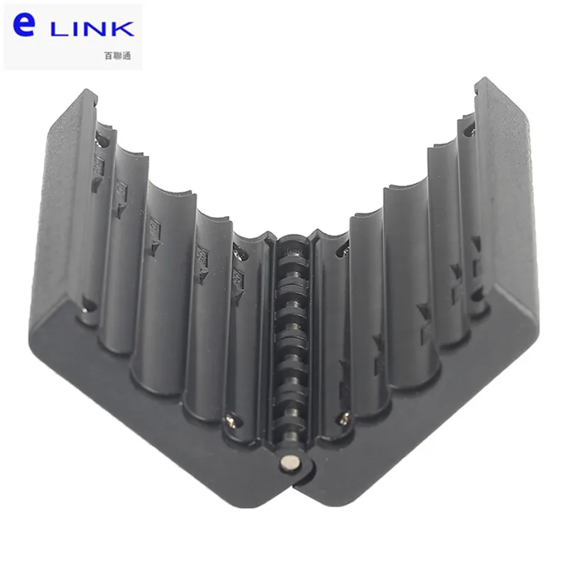 Una caja de plástico negro con un tornillo plateado