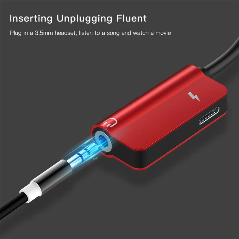 Un dispositivo rojo que se conecta a una toma de auriculares