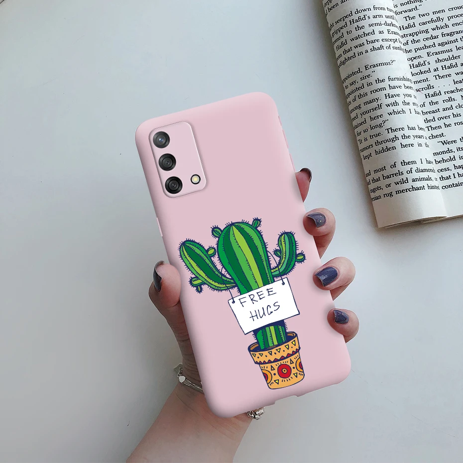 Una caja de teléfono celular rosa con un cactus