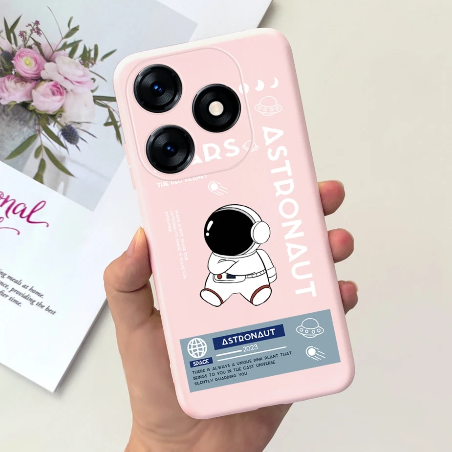 Una caja de teléfono rosa con una foto de un astronauta