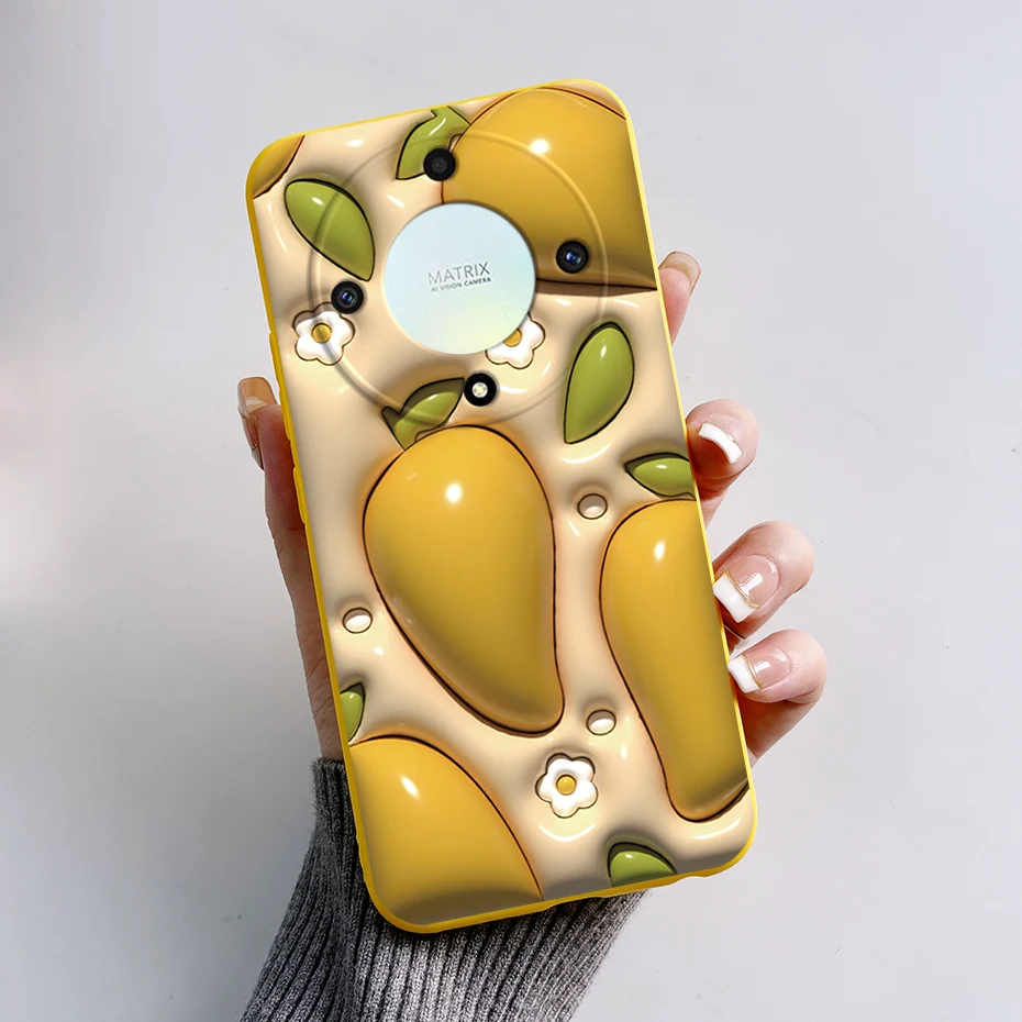 un teléfono celular amarillo con diseño de frutas