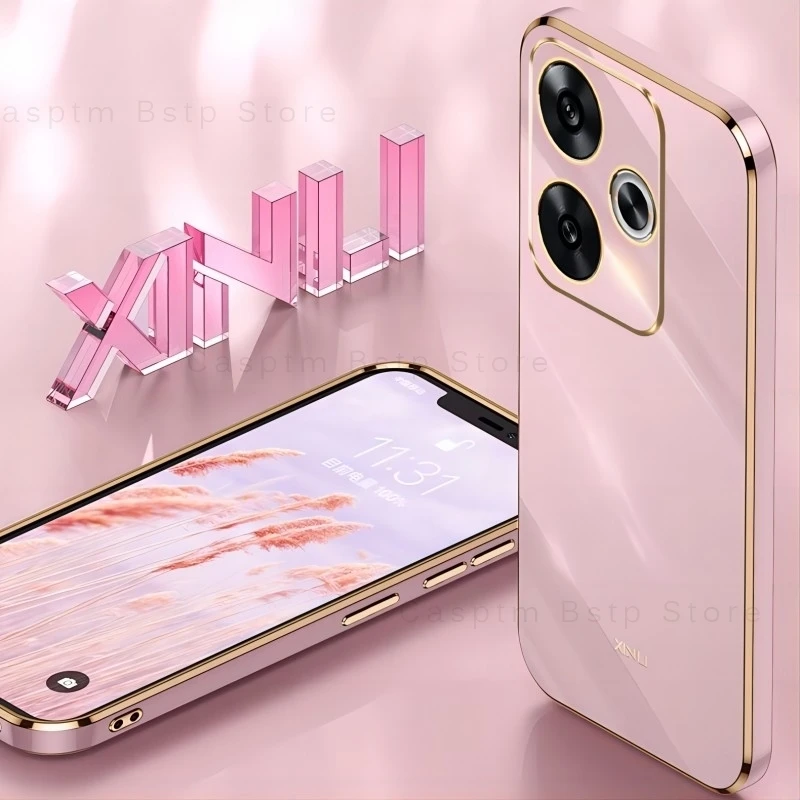 Un teléfono celular dorado con fondo rosa