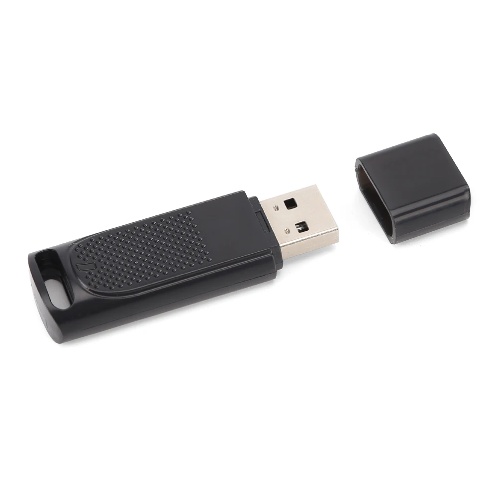Una unidad flash USB negra con una caja