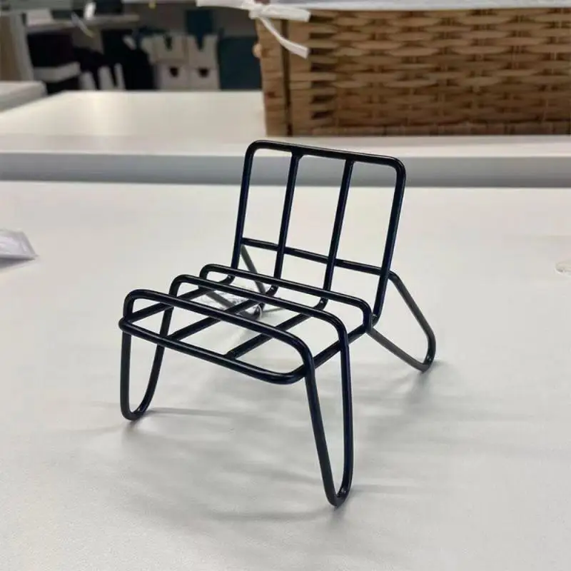 Soporte para teléfono móvil estilo Ins, soporte para teléfono móvil de escritorio con forma de silla Vertical Horizontal de hierro y Metal Simple y moderno negro - imagen 2