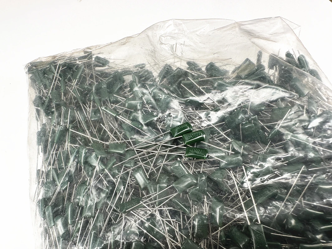 (1000 unids/bolsa) Condensador de poliéster 2A102J 100V102 1nF 1000PF distancia del pie 5mm 2A102 100V102J