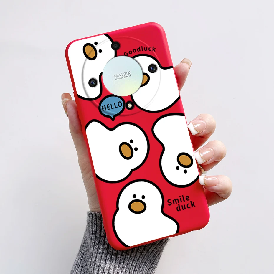 Un estuche rojo con patos blancos