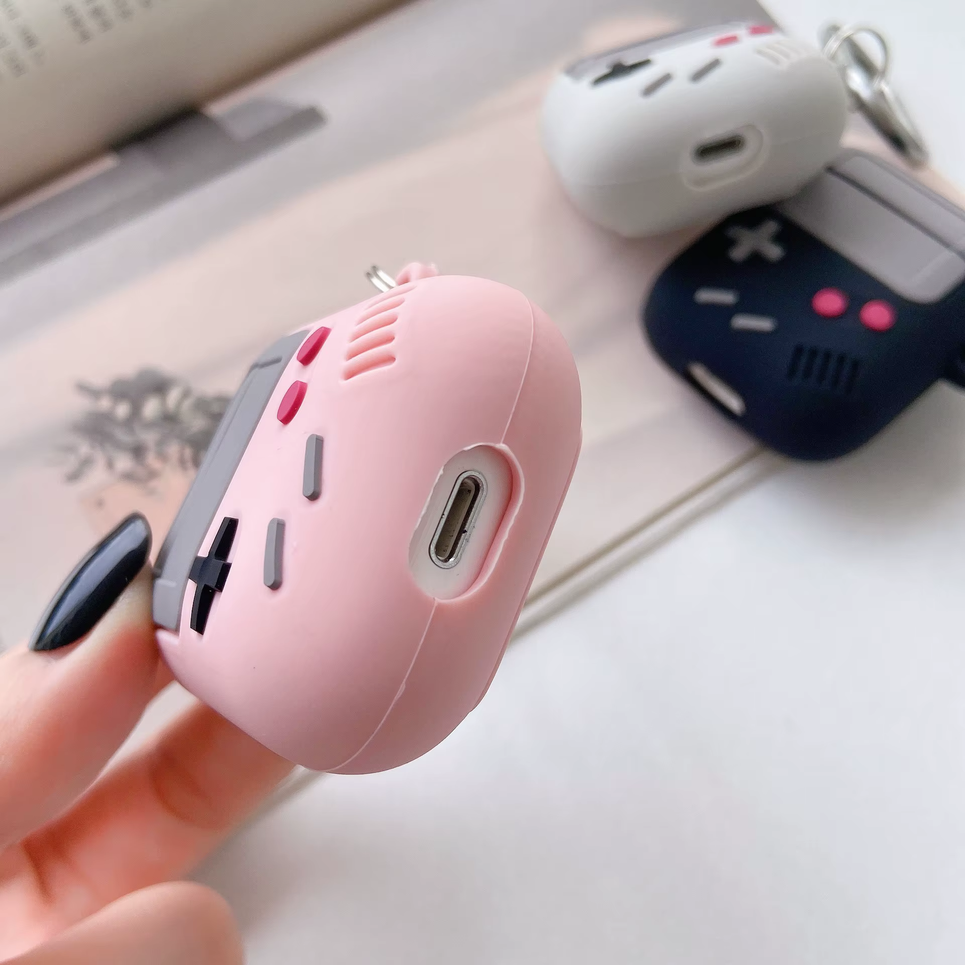 Funda de silicona con diseño de consola retro para AirPods