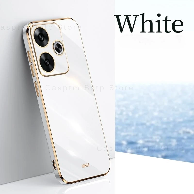 Se muestra un teléfono blanco con un adorno dorado sobre un fondo blanco.