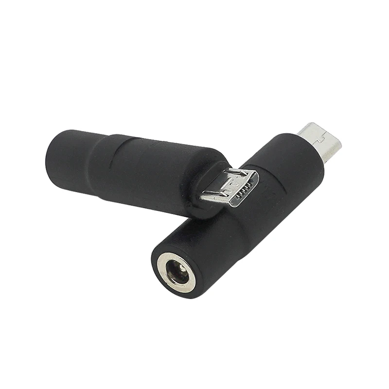 Un auricular negro con un cordón blanco