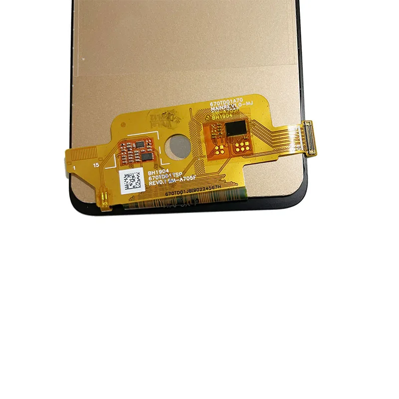 Un dispositivo electrónico de color dorado con una pegatina