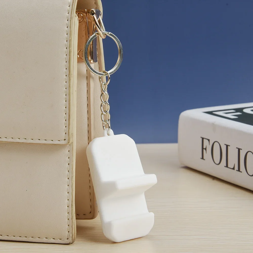 Mini soporte portátil de silicona para teléfono móvil con llavero, soporte creativo para escritorio, adornos decorativos, soporte para teléfono inteligente - imagen 5