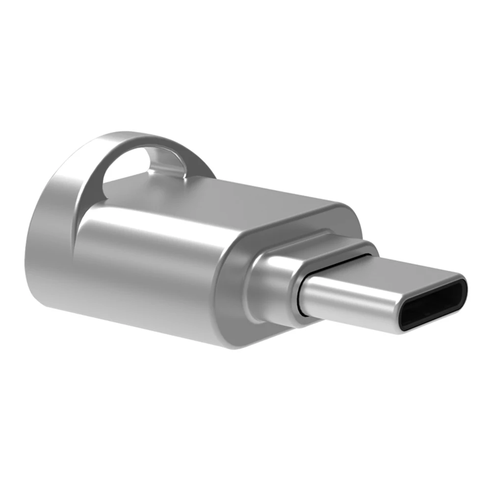 Un enchufe USB plateado con un conector negro