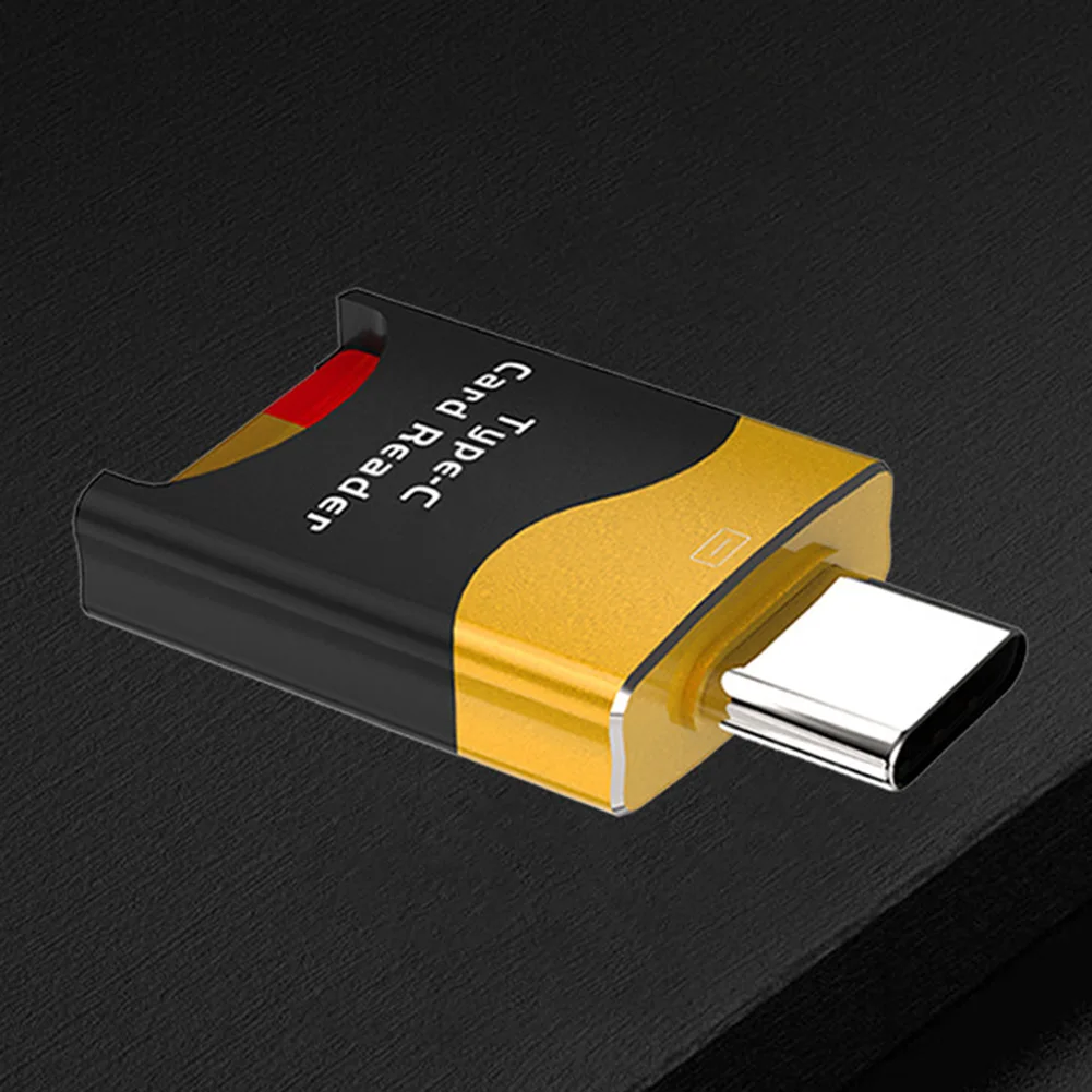 Una unidad flash USB con una caja negra y amarilla