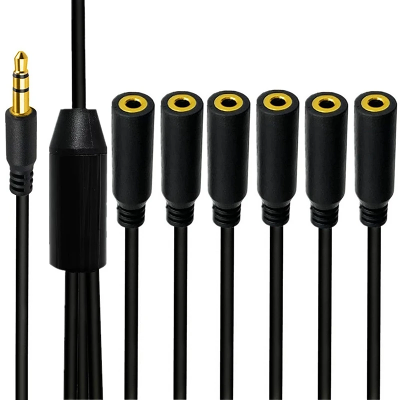 Un cable negro con tapones dorados en el extremo