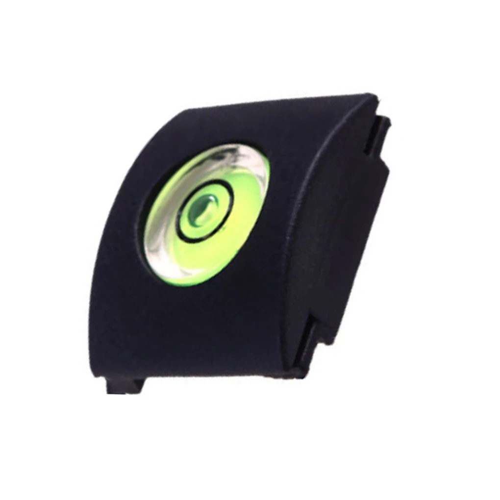 Un estuche negro con un círculo verde