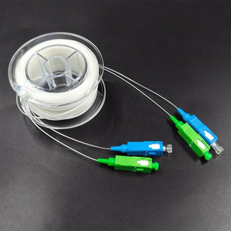 SC/apc cable de conexión transparente tambor dúplex G657A2 50m-100m cable de fibra óptica SCUPC puente invisible monomodo de un solo núcleo 60m80m