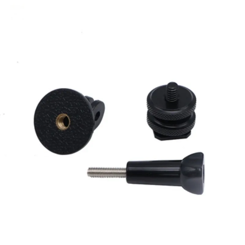 Una pieza de plástico negra con un tornillo