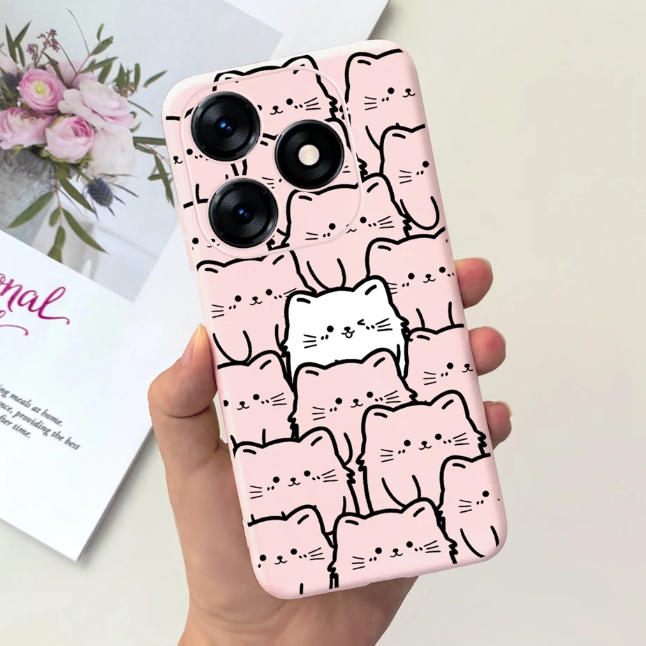 Una persona que sostiene un teléfono celular rosa con un gato