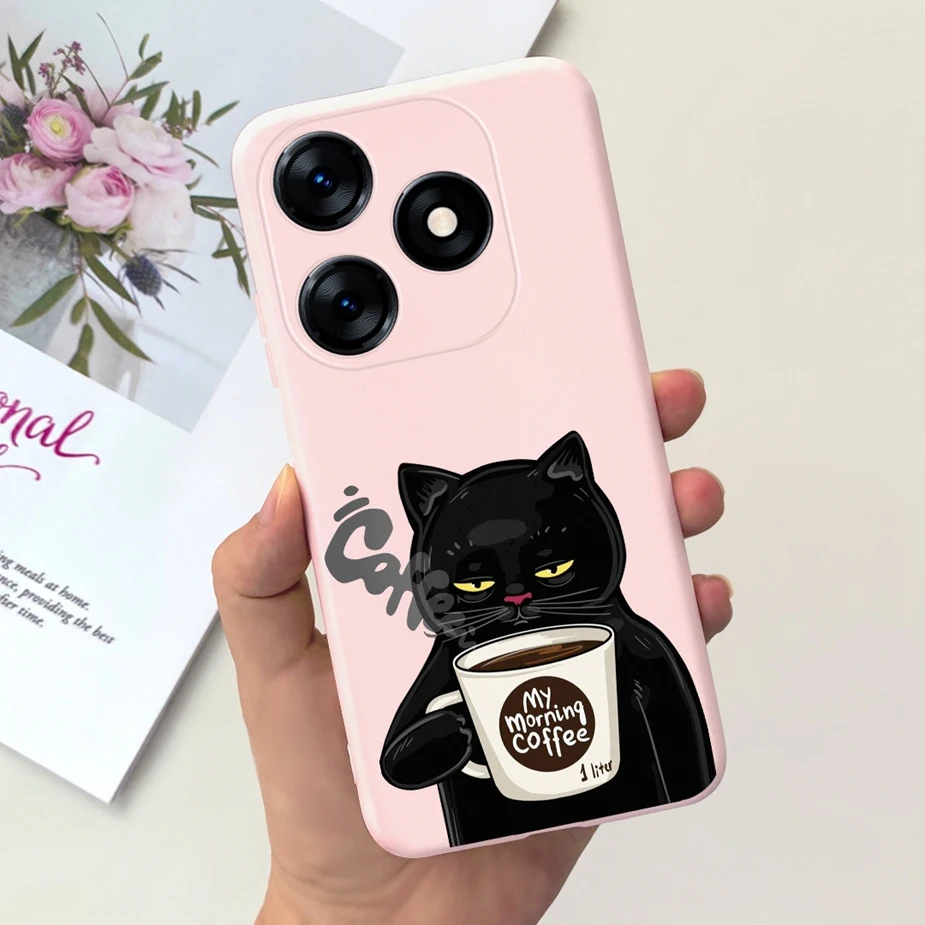 Una caja de teléfono rosa con un gato negro