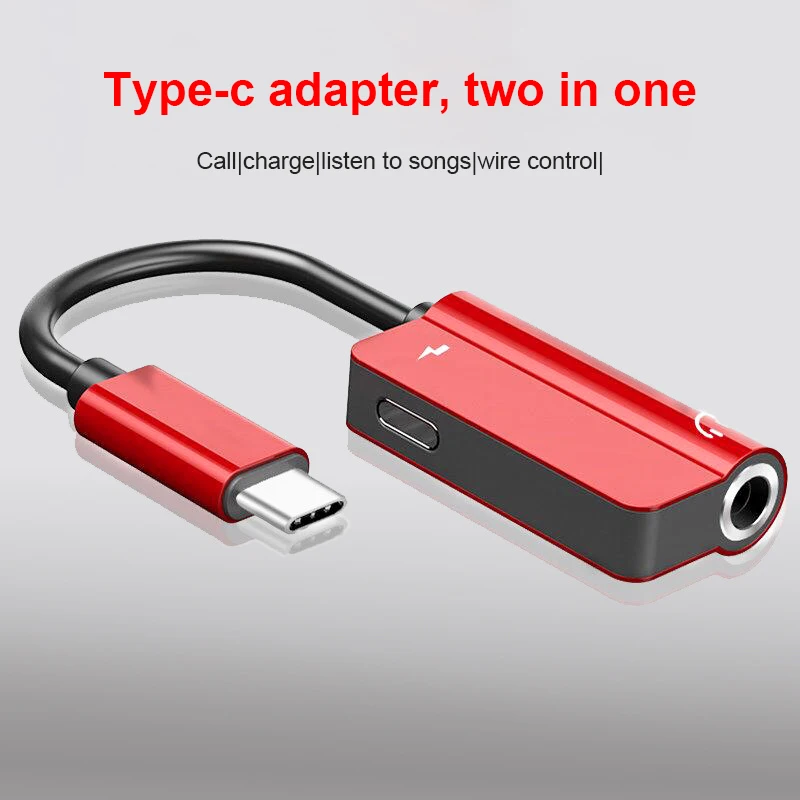 Un dispositivo rojo y negro con un enchufe USB