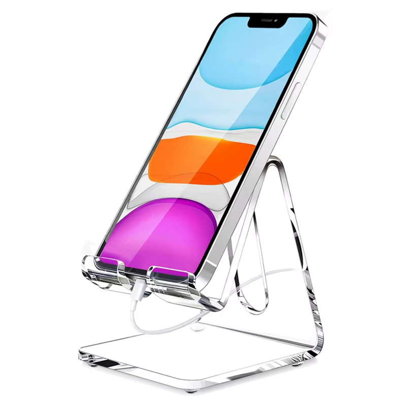 Soporte de acrílico transparente para teléfono sobre un escritorio