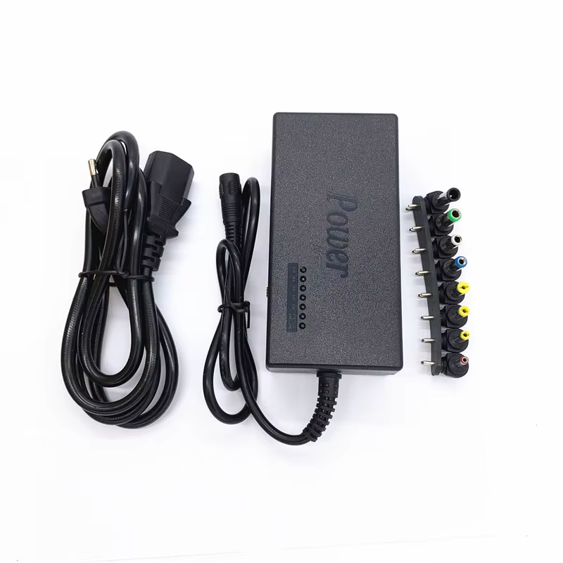Adaptador universal para portátil Lincoiah con selector de voltaje