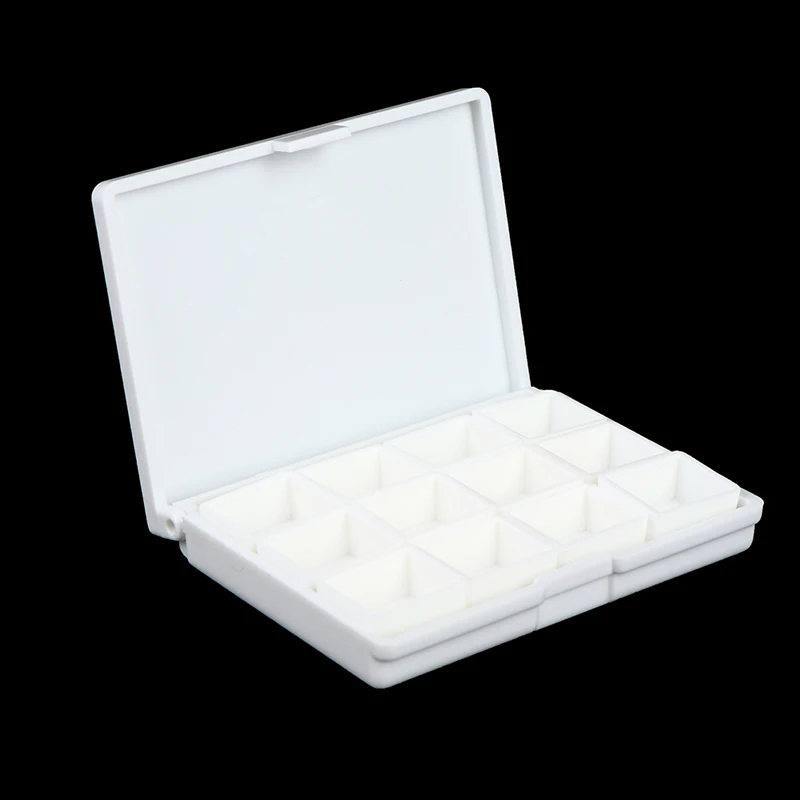 Paleta de acuarelas con rejillas blancas