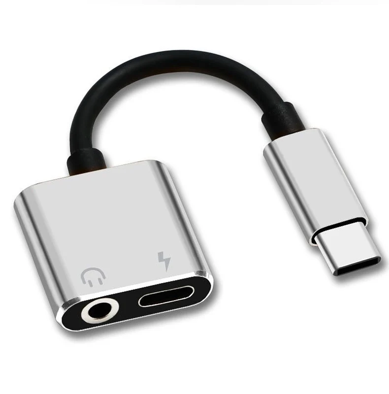 Adaptador conectado a móvil mostrando ambos cables