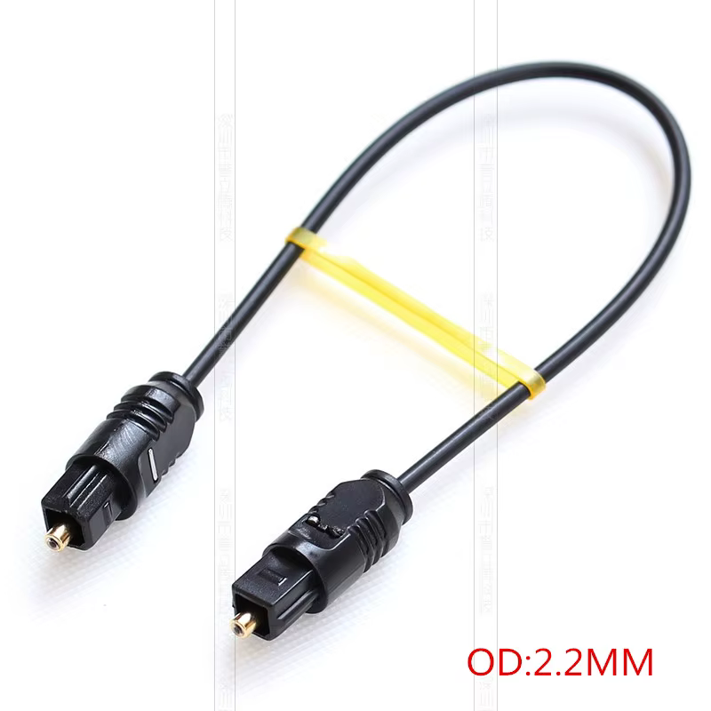 Cable TOSLINK 20 cm conectado a puerto óptico de TV