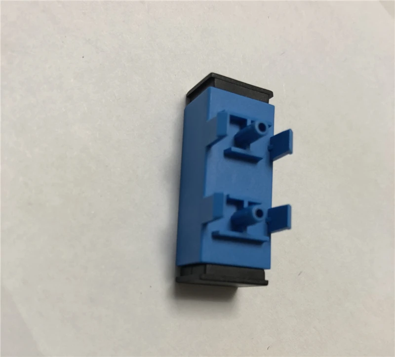 Detalle del cuerpo del adaptador y sistema de brida integrada