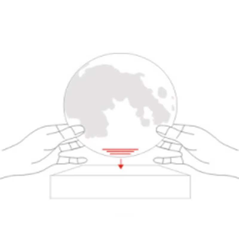 Lámpara de luna flotando sobre su base